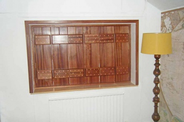 03-made-to-measure-trifold-bedroom-shutters-sapele-wood