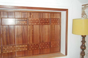 04-made-to-measure-trifold-bedroom-shutters-sapele-wood