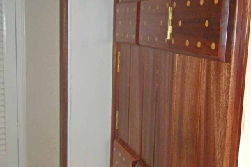 05-made-to-measure-trifold-bedroom-shutters-sapele-wood