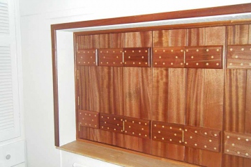 06-made-to-measure-trifold-bedroom-shutters-sapele-wood