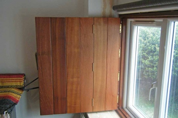05-made-to-measure-trifold-front-bedroom-shutters-sapele-wood