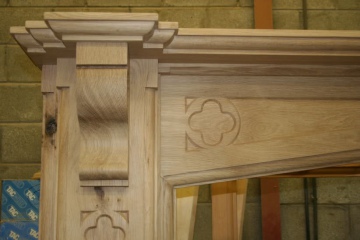 005-large-oak-fireplace-in-workshop-decorative-quatrefoil-carved-into-corbel