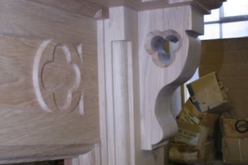 008-large-oak-fireplace-in-workshop-right-hand-pillar-corbel-with-relief-quatrefoil-set-in-head-piece