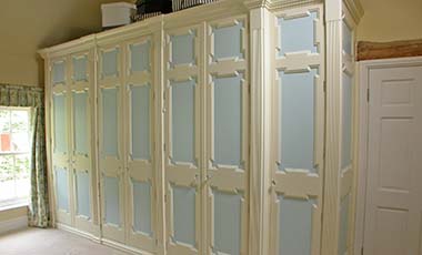 Large fitted country style wardrobes with doors closed