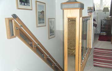 handmade staircase made in ash wood with chrome accents