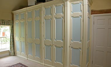 Large fitted country style wardrobes with doors closed